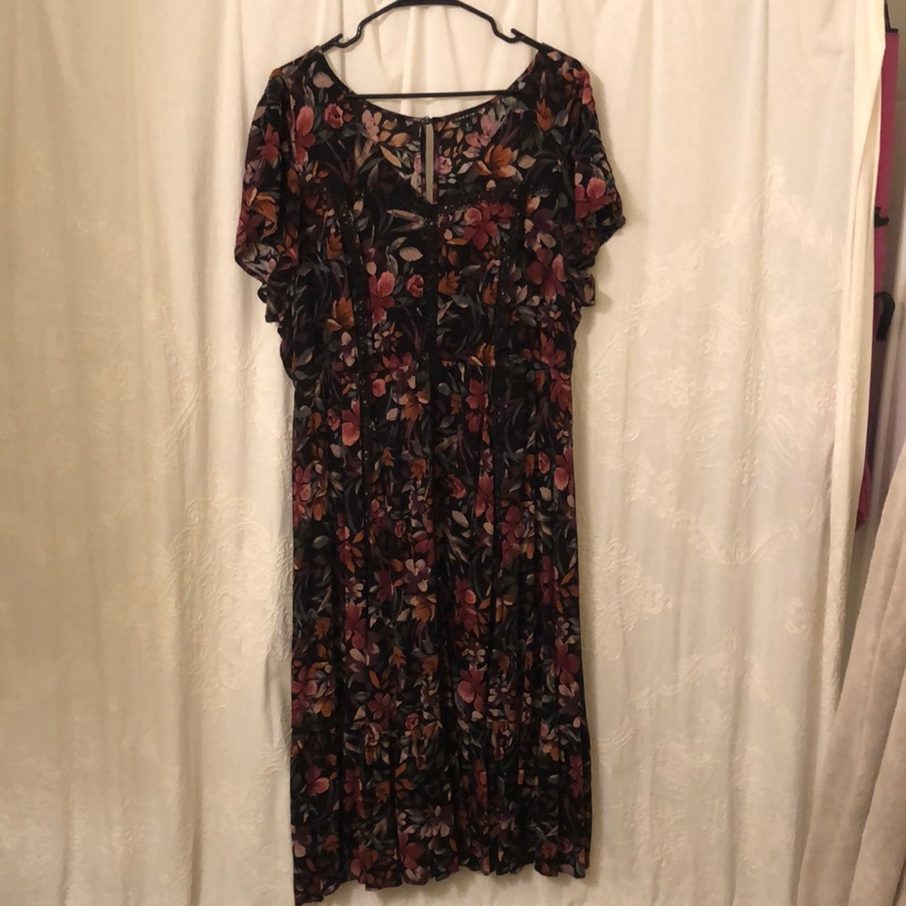 Dark floral dress with black lace detail. Black second layer underneath